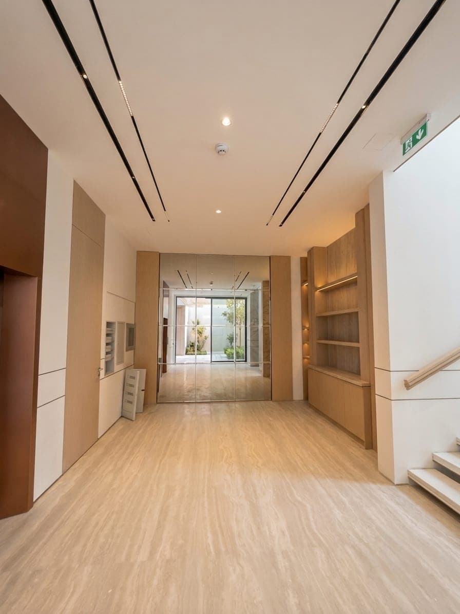 A gallery corridor finished in oak flooring and joinery