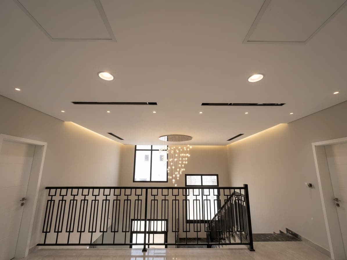 The upper landing and its balustrade above the void