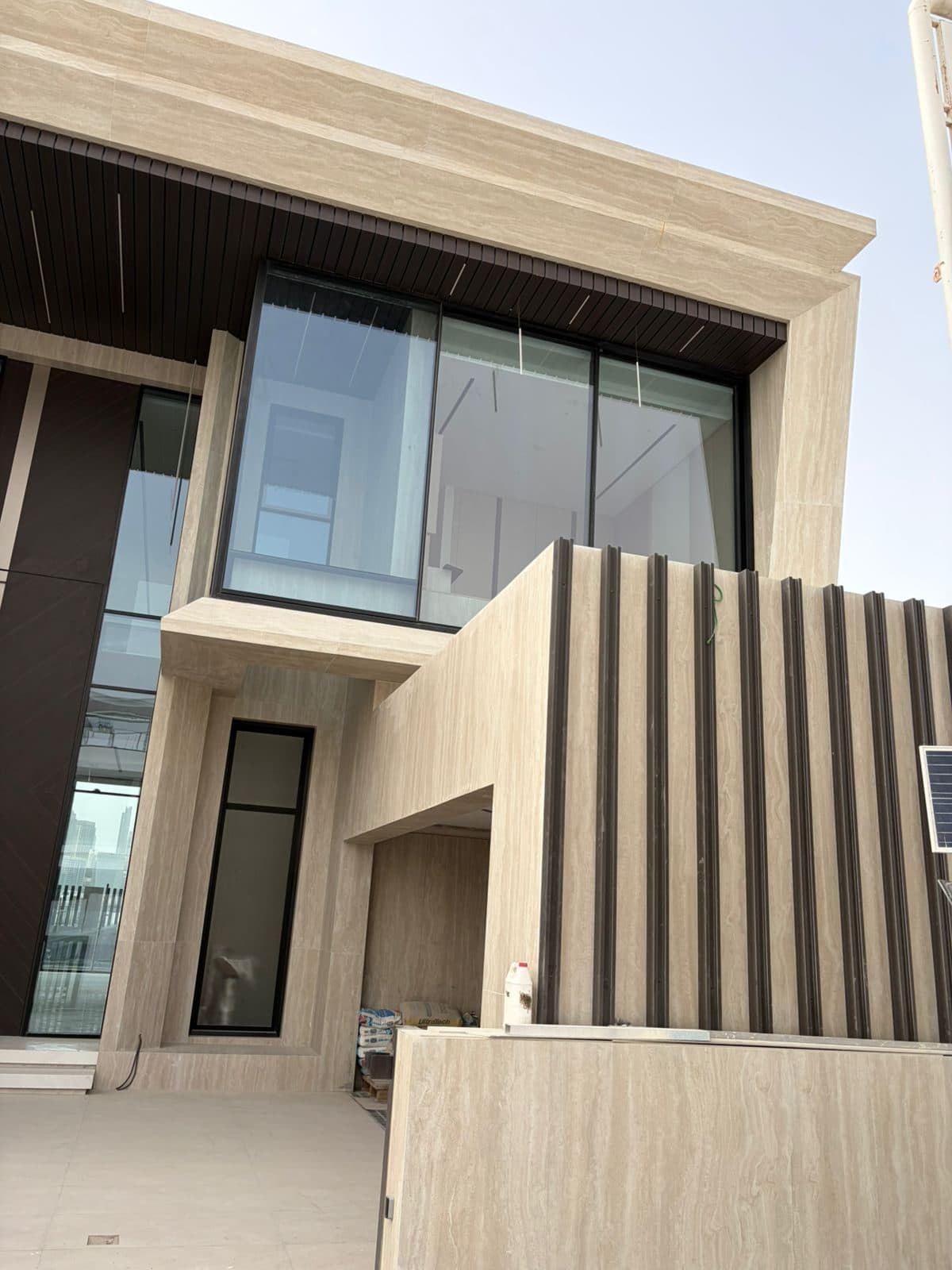 Vertical fins turning the building's corner
