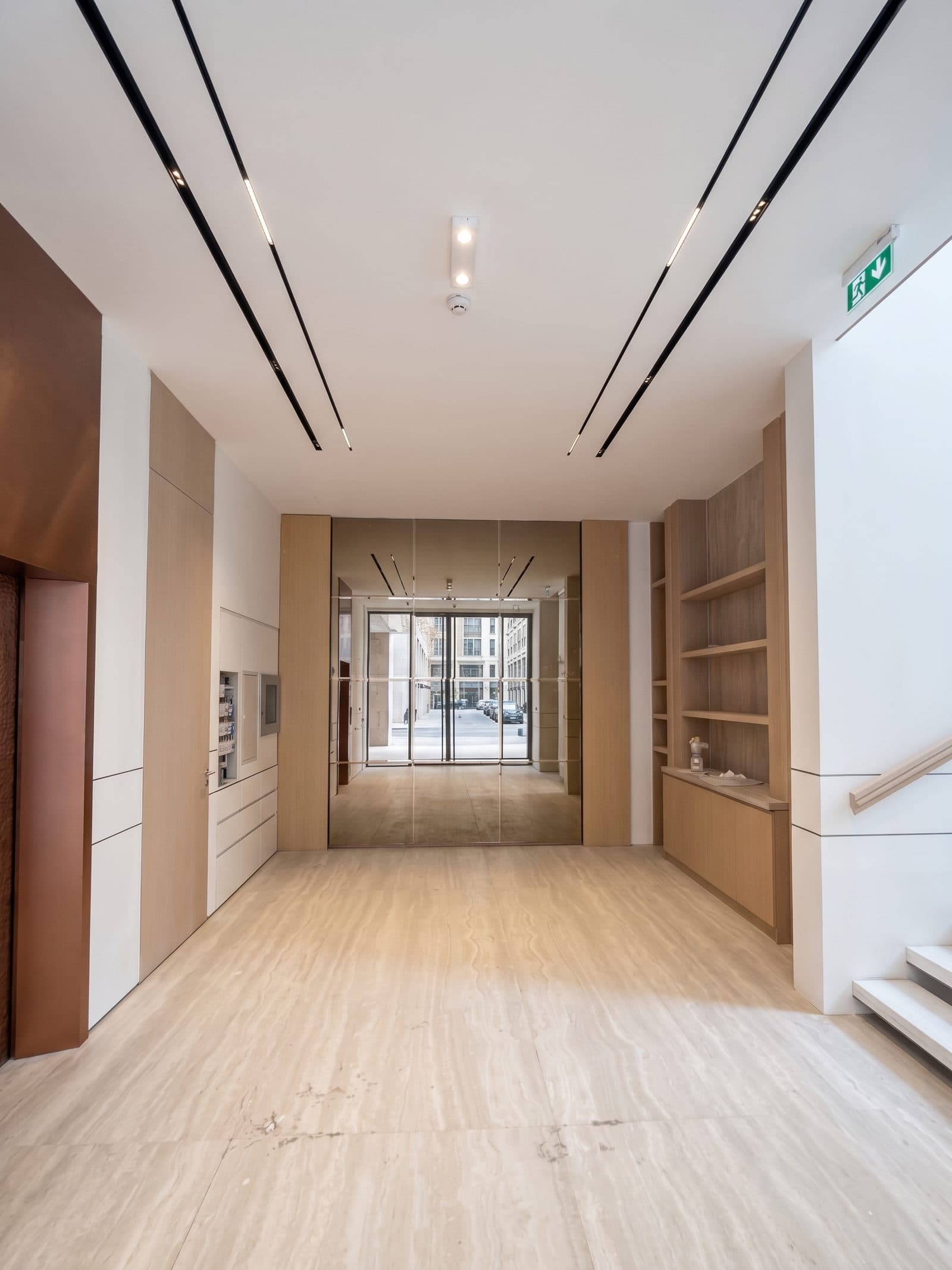 Corridor joinery running the length of the wall