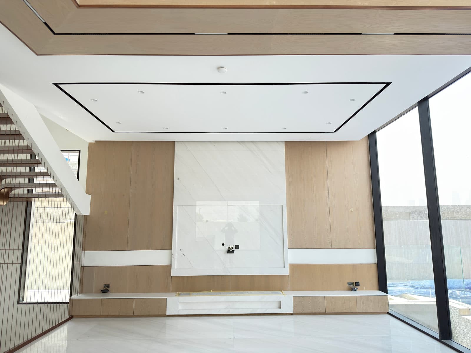 Close view of the marble's book-matched veining across the joint